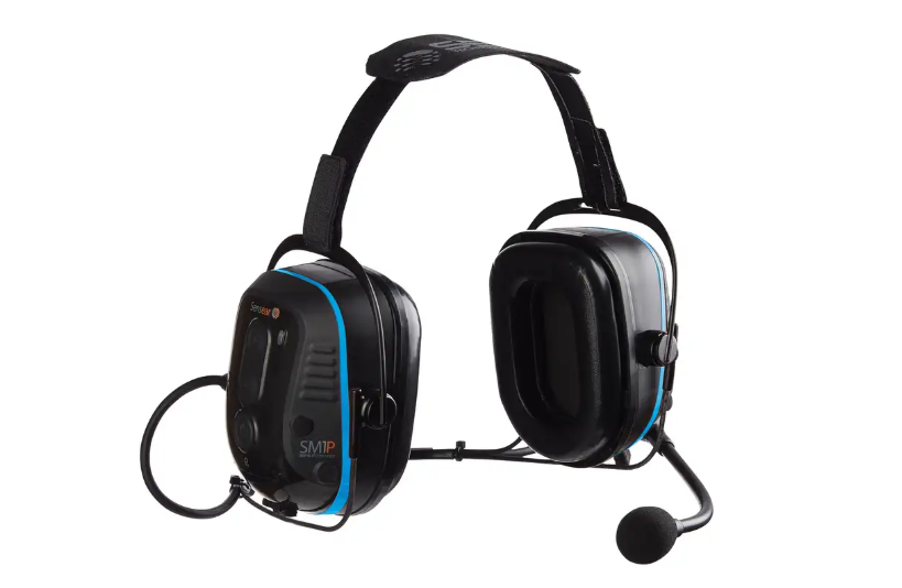 Oil and gas technician wearing SM1P-Ex headset in hazardous Class I Division 1 area with SENS technology for situational awareness