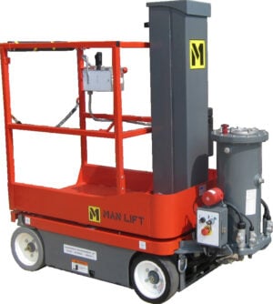 A compact, industrial MVL16EX explosion-proof vertical mast man lift featuring a 27 x 36 inch platform and a 21 ft 6 in working height. The unit is finished in high-visibility safety yellow and includes proportional drive controls, a movement alarm, and an integrated battery charging system. It is specifically engineered with a 'T-Box' design to separate the motor from controls for Class 1, Division 1, Group D hazardous environments.