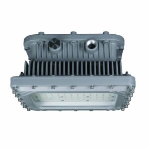 High-voltage Nicor XPQ1B Titan LED flood light, specifically engineered for 347-480VAC industrial electrical systems. Front view shows a rugged gray die-cast aluminum housing and tempered glass lens, designed for Class I Division 2 hazardous locations.